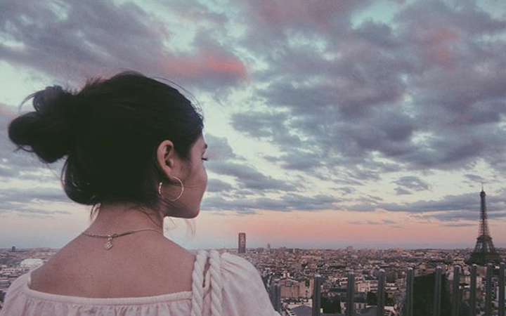 Girl at sunset in Paris
