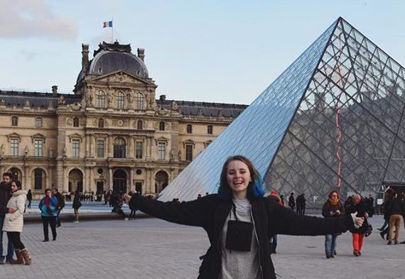 Girl in front of the Louvre