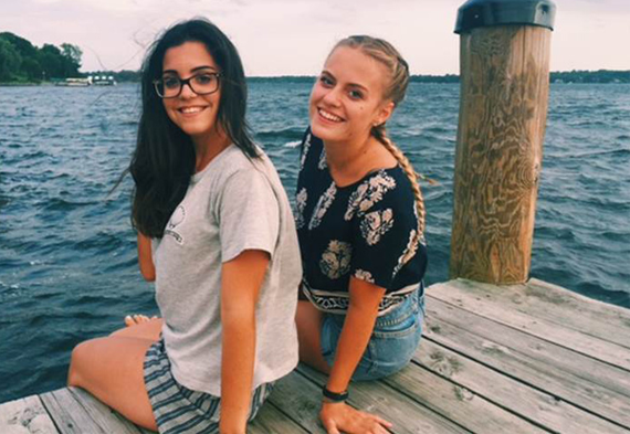 Two girls on a pier