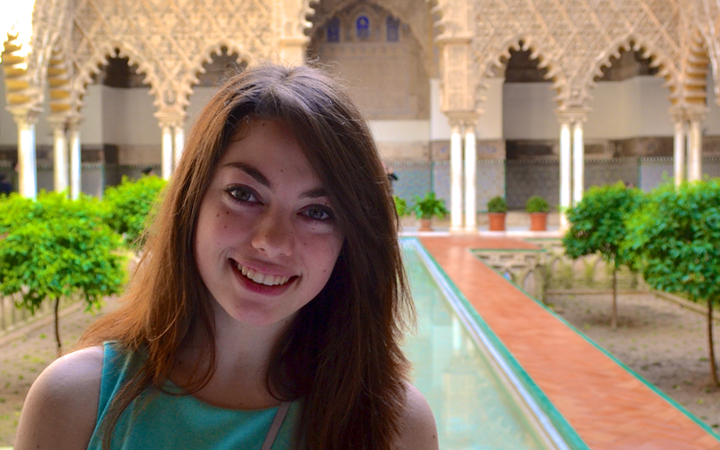 Girl by Alhambra reflecting pool