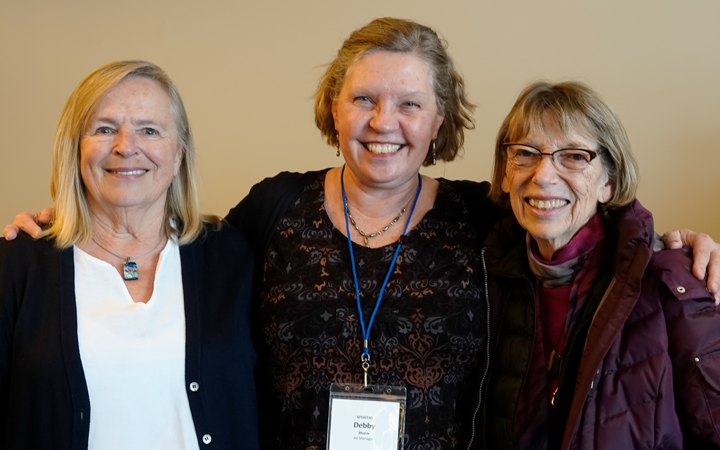 Three smiling women