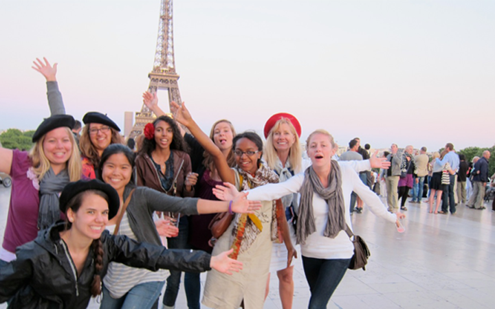 Happy group at the Eiffel Tower