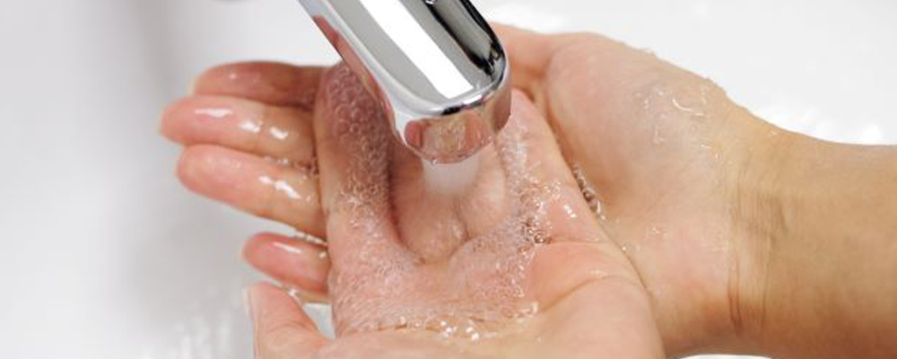 woman washing hands