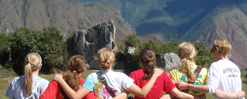 Kids with mountain behind