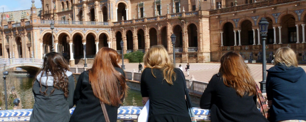 Girls on a bridge in Sevilla