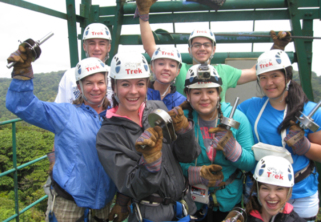 Student group with teacher on a zipline platform