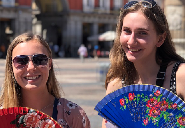 Two women with fans