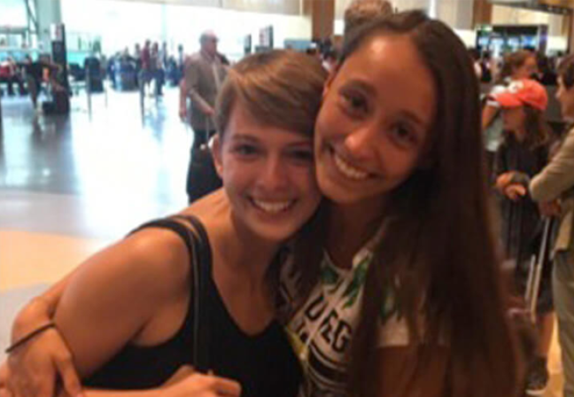 Two girls hugging