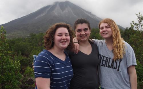 3 Girls with Arenal Volcano in Background in Costa Rica