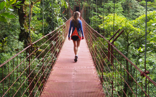 Girl on a rope bridge