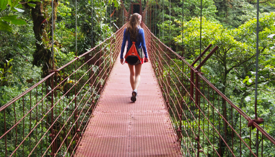 Girl on a rope bridge