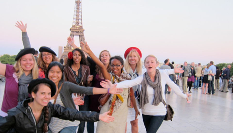 Happy group at the Eiffel Tower