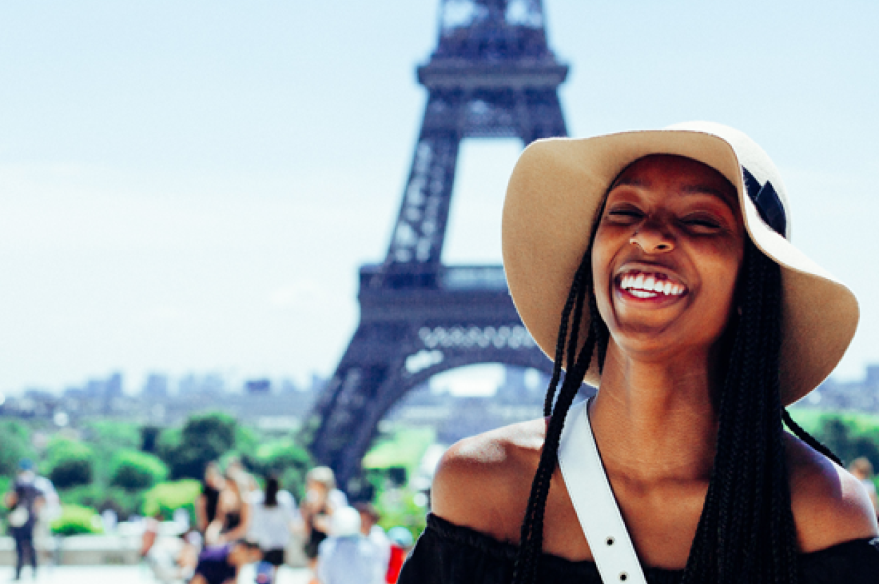 Girl in front of Eiffel Tower