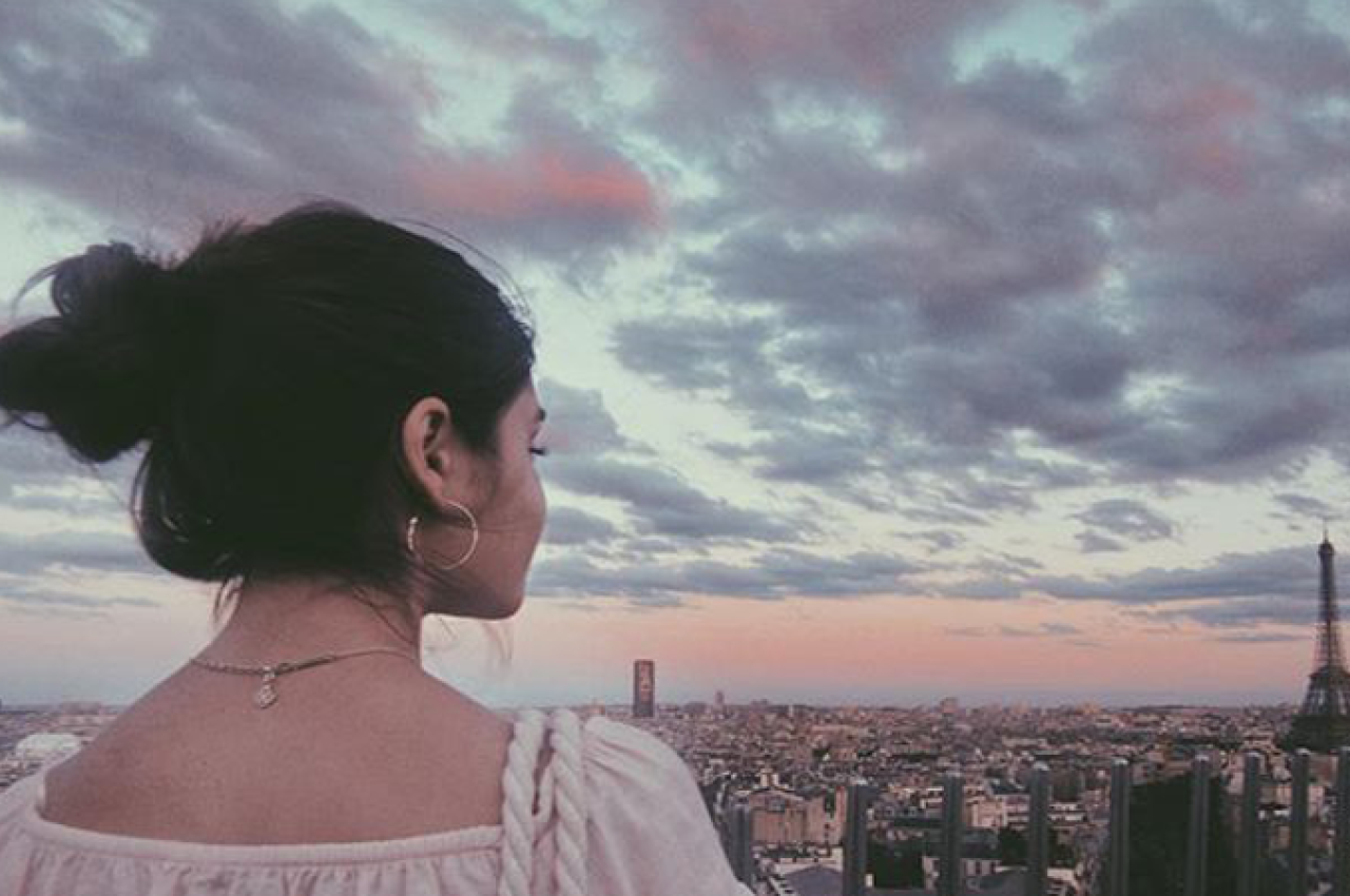 Girl at sunset in Paris