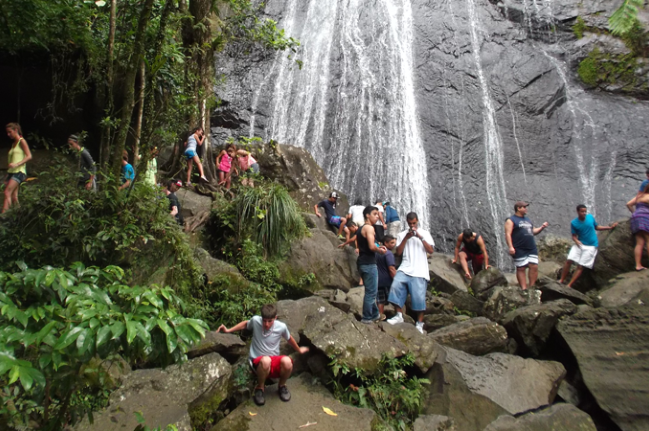 Students exploring El Yunque falls