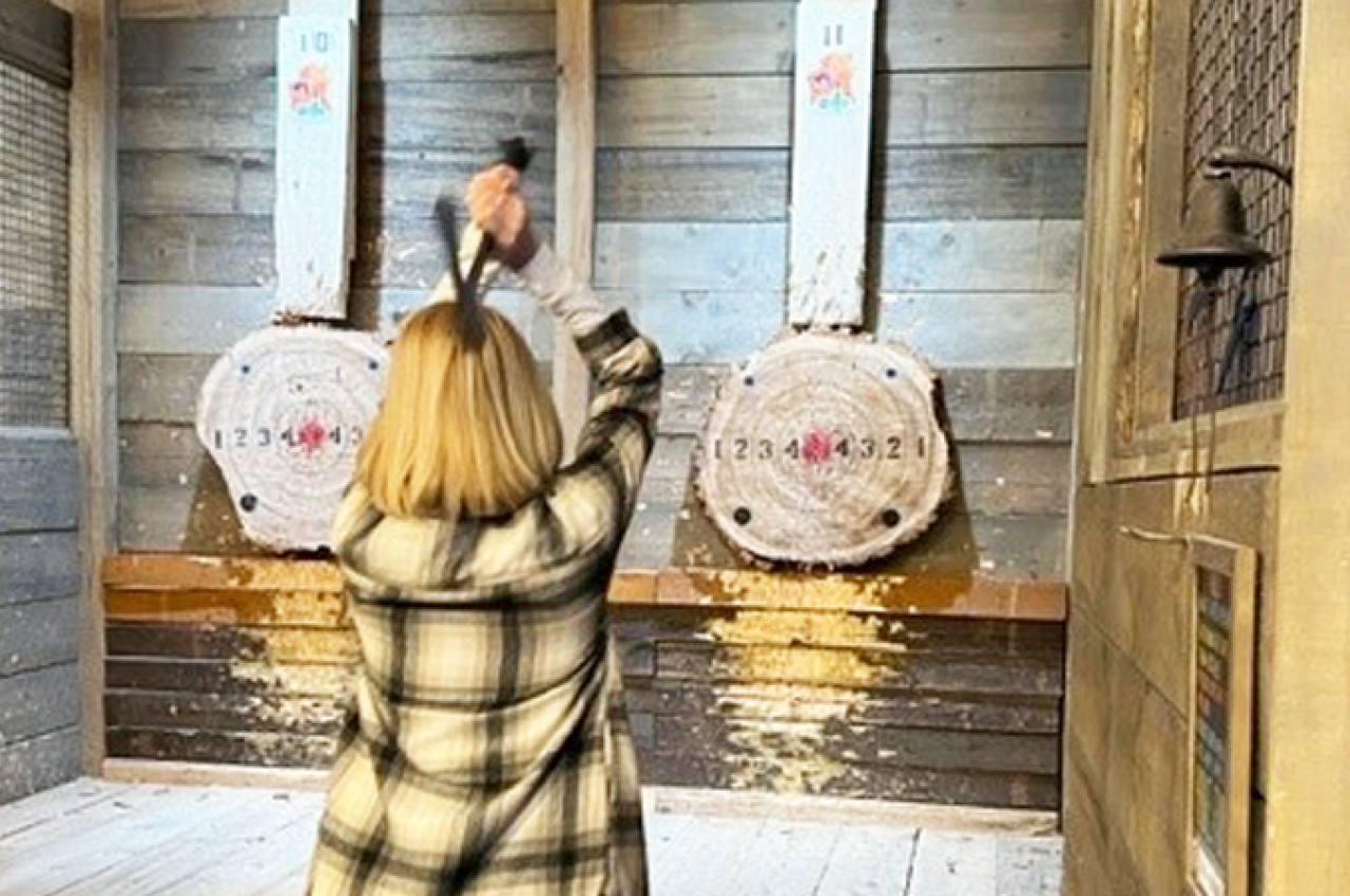 Woman throwing Axe