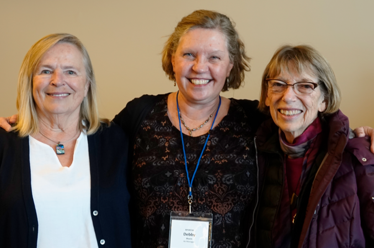 Three smiling women