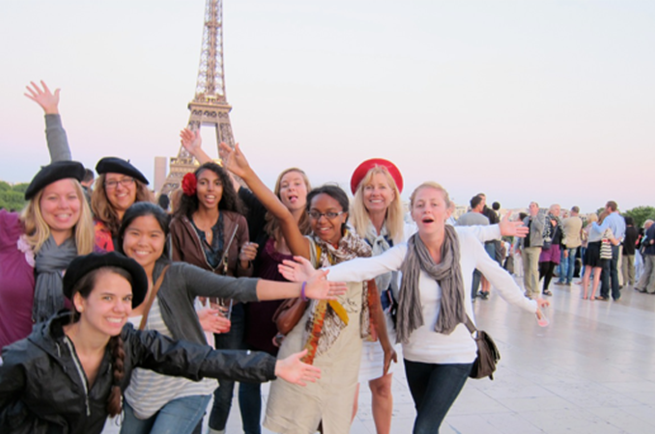 Happy group at the Eiffel Tower