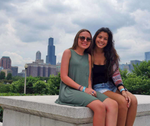 Two girls on a city bench