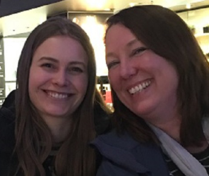 Two women smiling