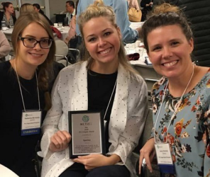 Three women and an award